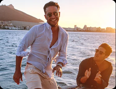 Friends enjoying a stag do aboard an Auckland party yacht