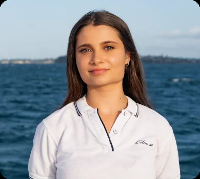 A member of Liberté's crew, on a private yacht charter from Auckland