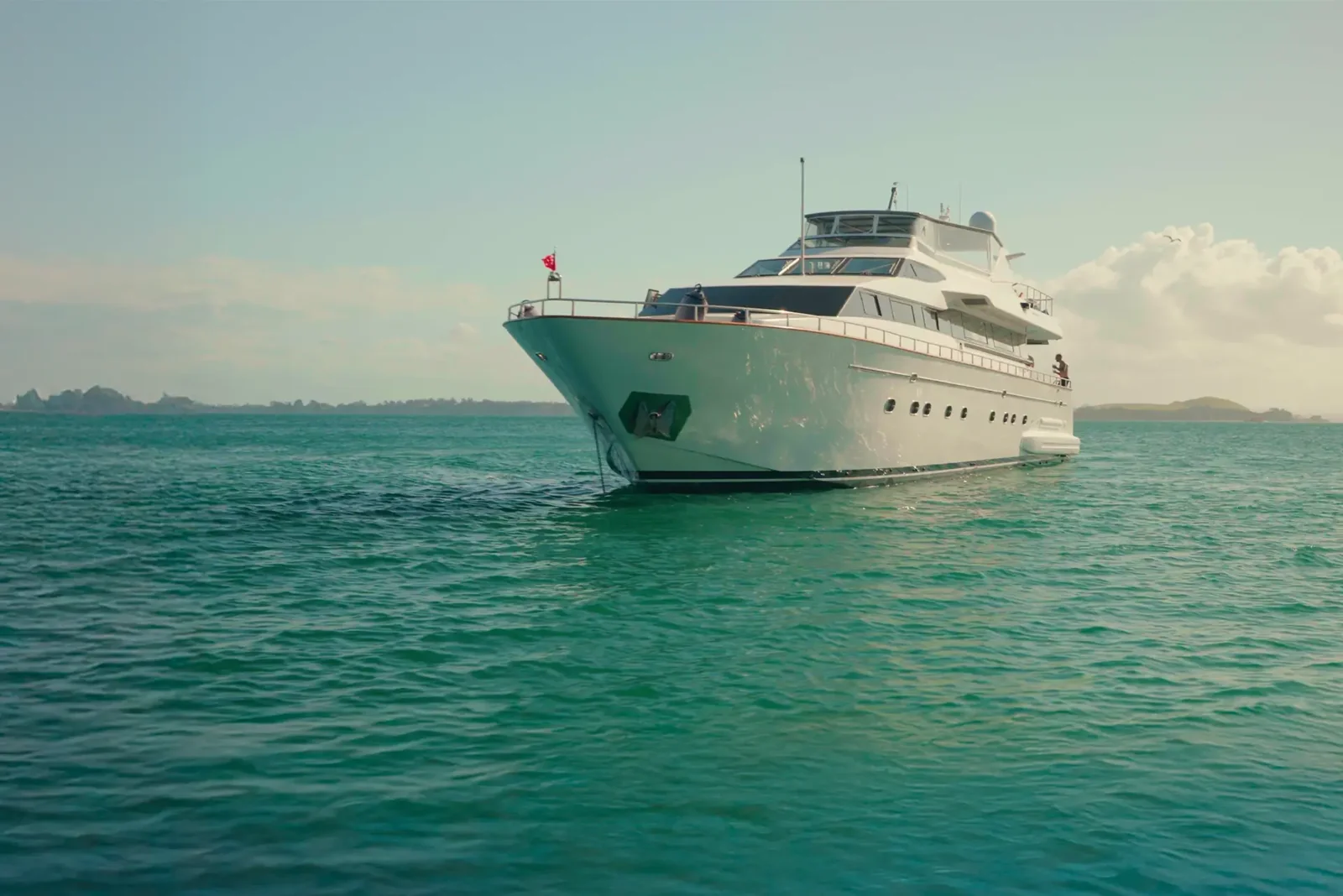 Liberté at anchor, on a private yacht charter from Auckland