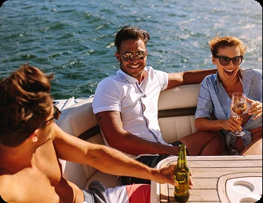 Guests enjoying a Christmas party yacht charter in Auckland