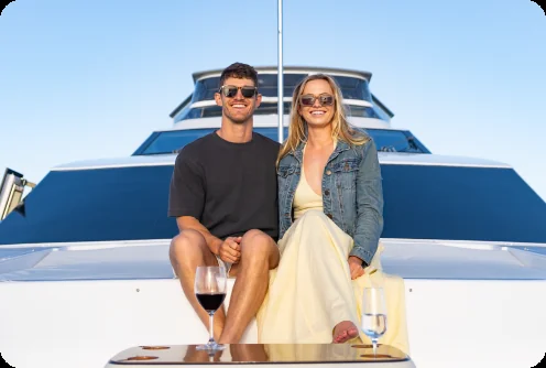 Couple aboard Liberté, for birthday yacht charters in Auckland
